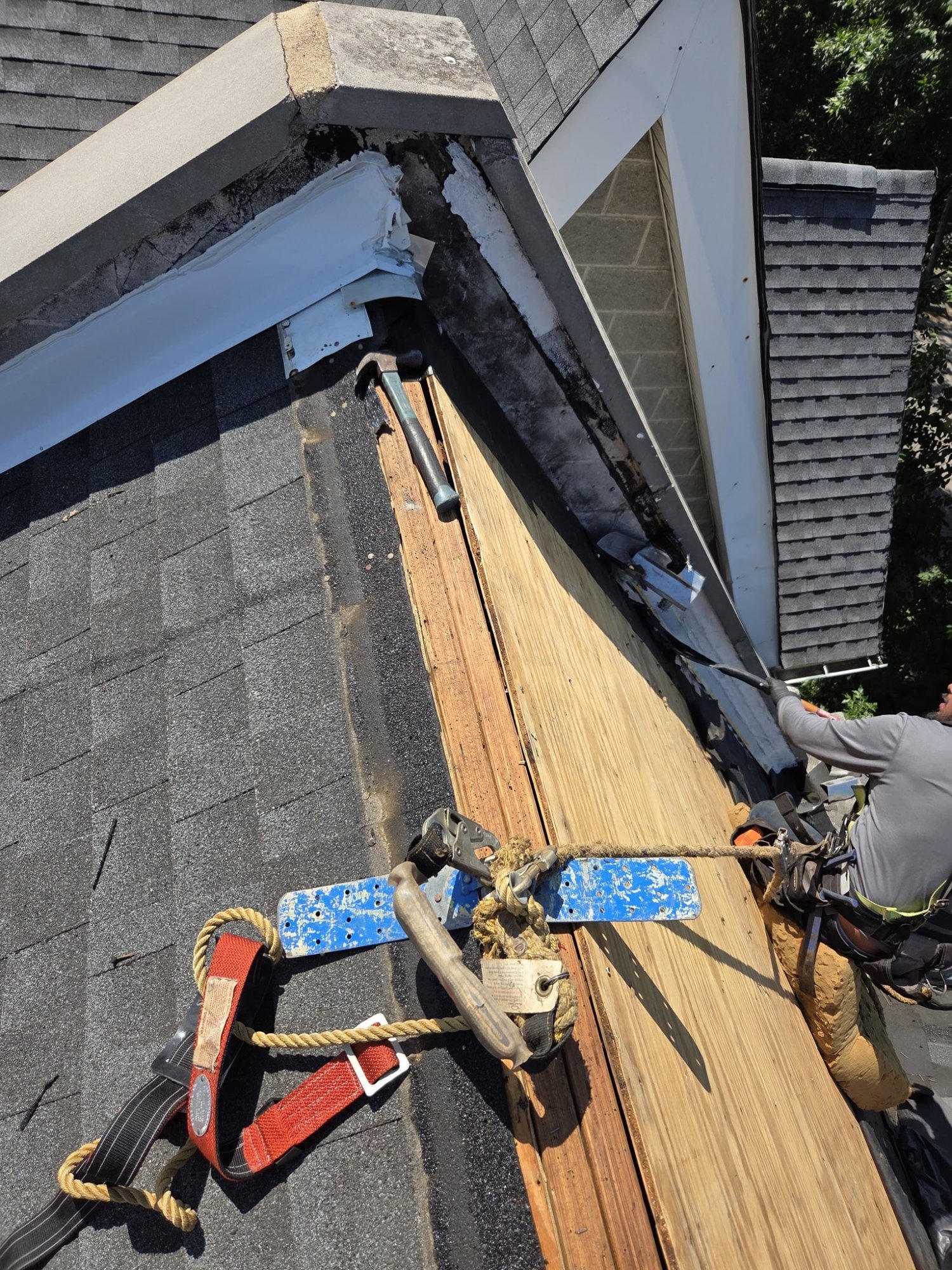 Aerial view of roof tear-off in progress