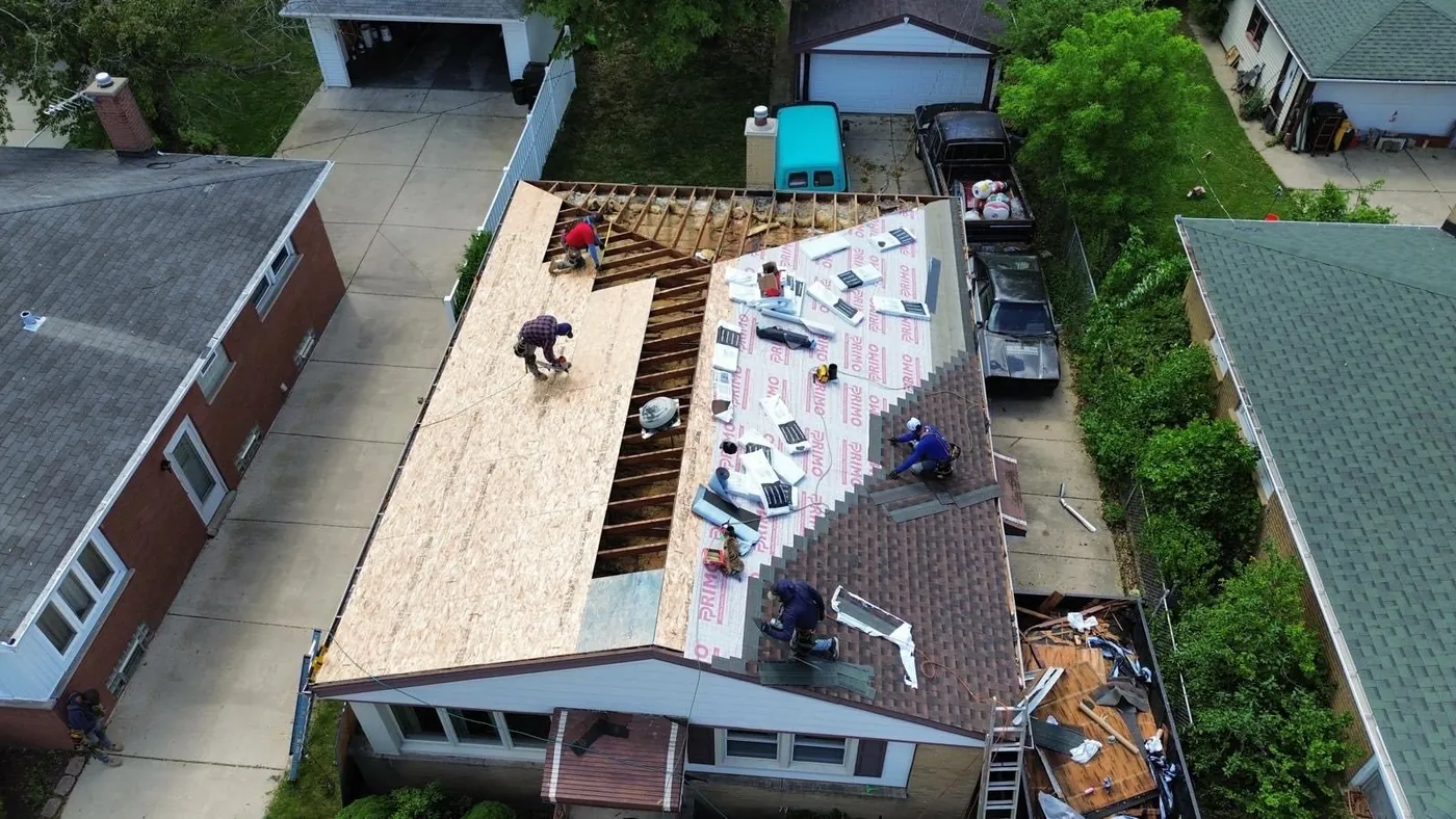 Mid-replacement showing new plywood decking and underlayment