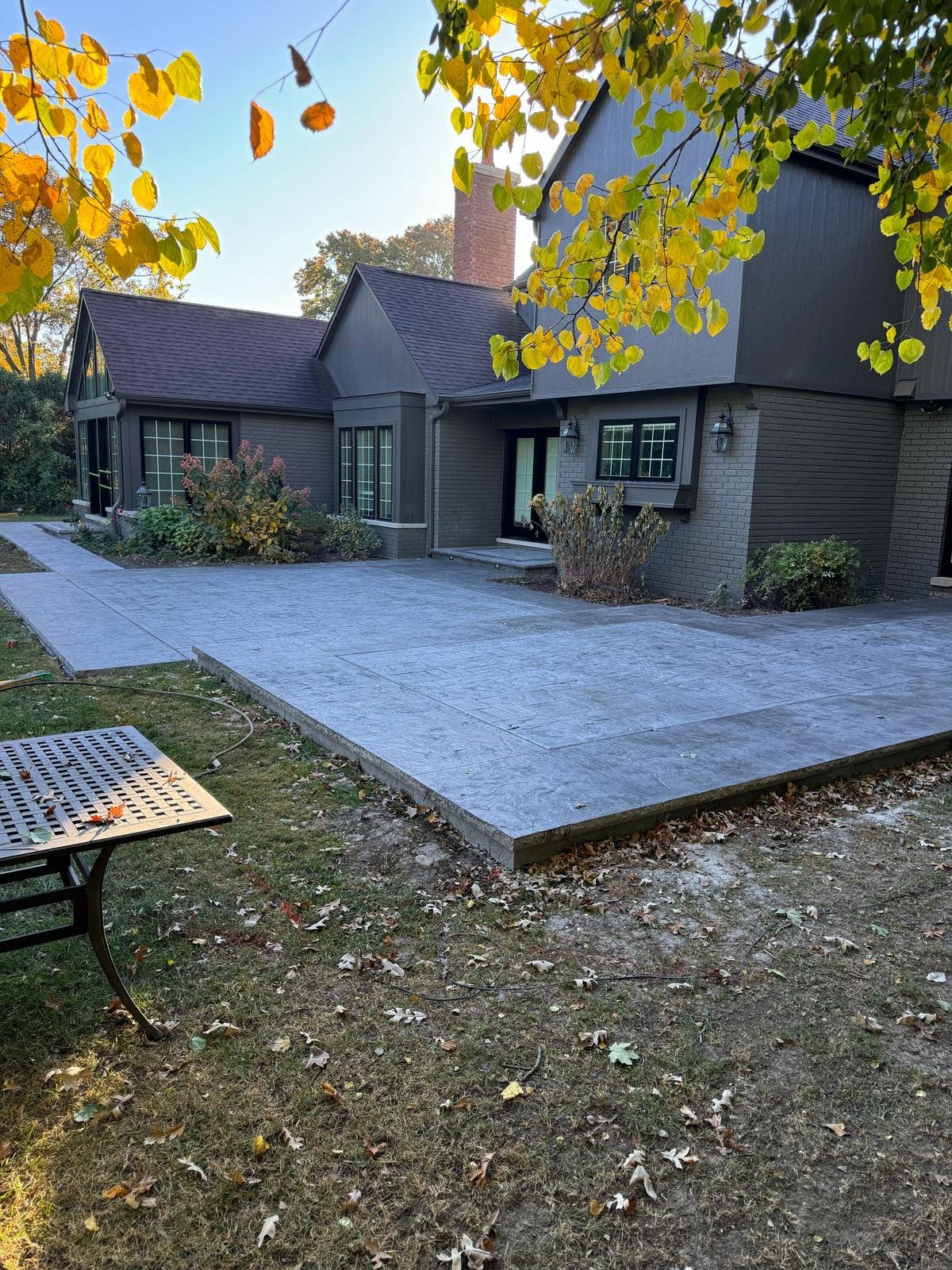 Stamped concrete patio installation at residential home