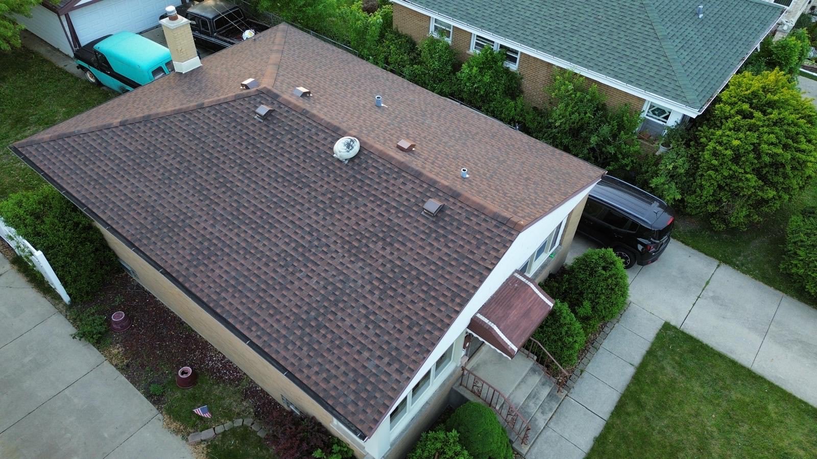 Completed residential shingle roof aerial view